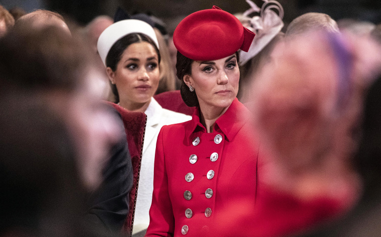 Catherine, The Duchess of Cambridge sits near Meghan, Duchess of Sussex.