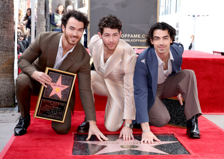 Kevin Jonas, Nick Jonas, and Joe Jonas of The Jonas Brothers attend The Hollywood Walk of Fame star ceremony honoring The Jonas Brothers.