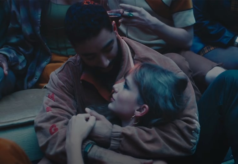 Taylor Swift and Laith Ashley get cozy in "Lavender Haze."