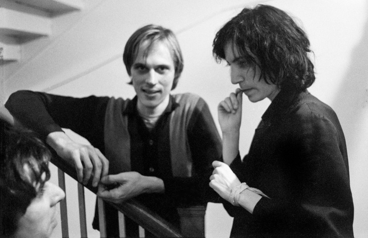 Patti Smith backstage with Tom Verlaine of Television before performing at the event "Arista Records Salutes New York with a Festival of Great Music” at City Center. September 21, 1975.