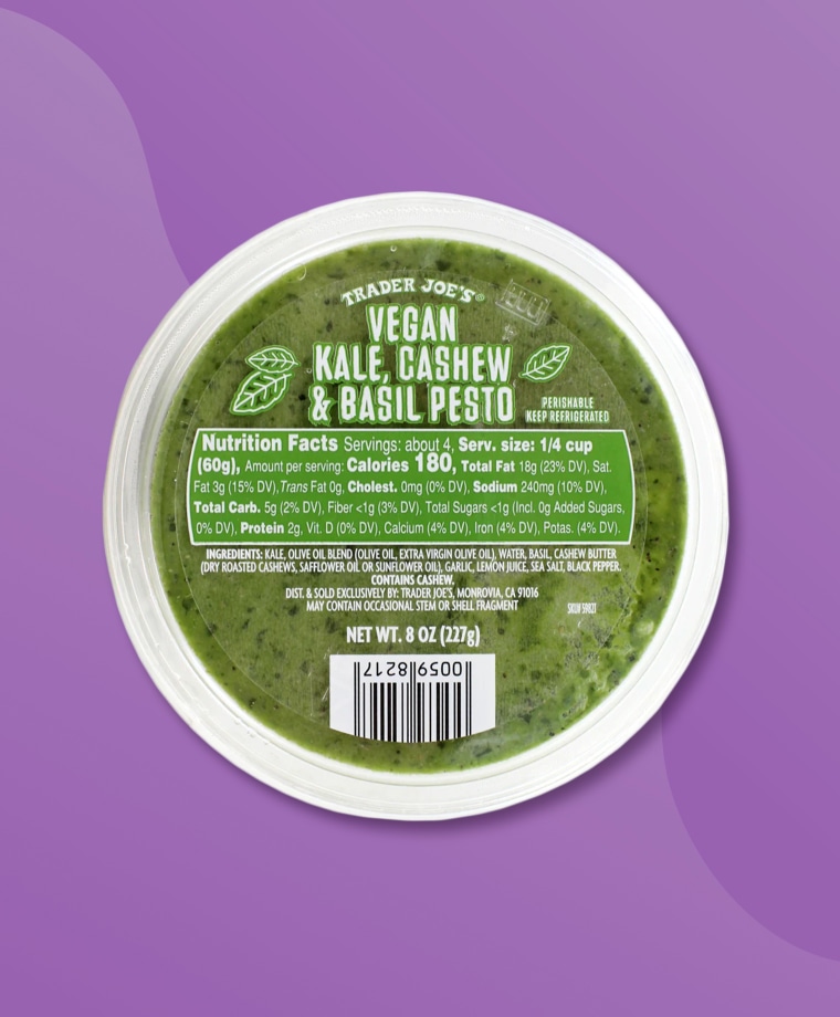 Trader Joe's Vegan Kale & Cashew Pesto on a purple background.
