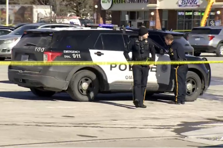 Police investigate reports of a shooter at a Target in Omaha, Neb., on Tuesday.