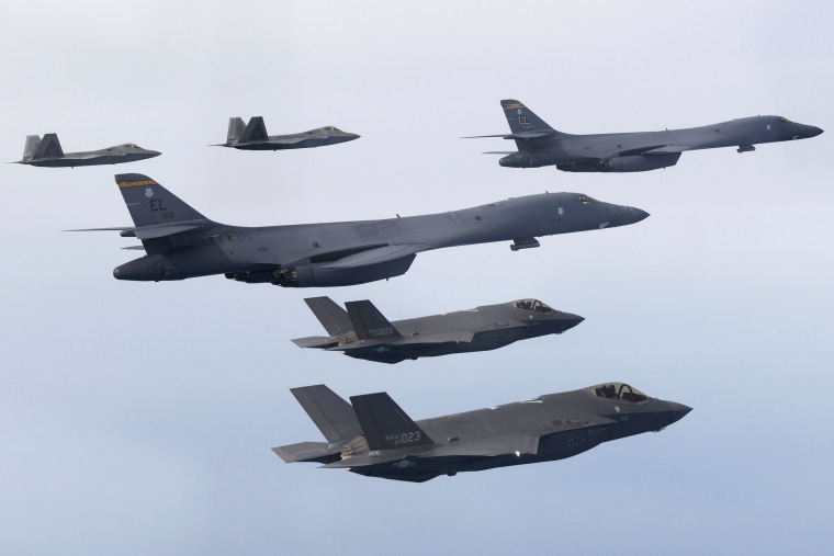 In this photo provided by South Korean Defense Ministry, U.S. Air Force B-1B bombers, center, F-22 fighter jets and South Korean Air Force F-35 fighter jets, bottom, fly over South Korea Peninsula during a joint air drill in South Korea, Wednesday, Jan. 1, 2023. North Korea on Thursday, Feb. 2, threatened the "toughest reaction" to the United States' expanding joint military exercises with South Korea to counter the North's growing nuclear weapons ambitions, claiming that the allies were pushing tensions to an "extreme red line." (South Korean Defense Ministry via AP)
