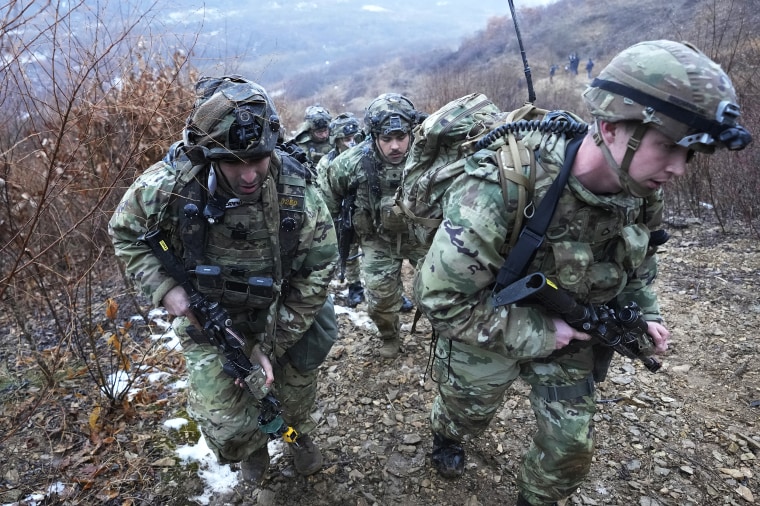 U.S. Army soldiers march during a joint military drill between South Korea and the United States in Paju, South Korea, Friday, Jan. 13, 2023. The drill involved the "Army Tiger Demonstration Brigade", which has been created to support South Korean Army's integration and use of Industry 4.0 technologies. (AP Photo/Ahn Young-joon)