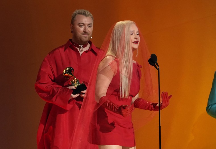 Kim Petras, right, and Sam Smith accept the award for best pop duo/group performance for "Unholy."
