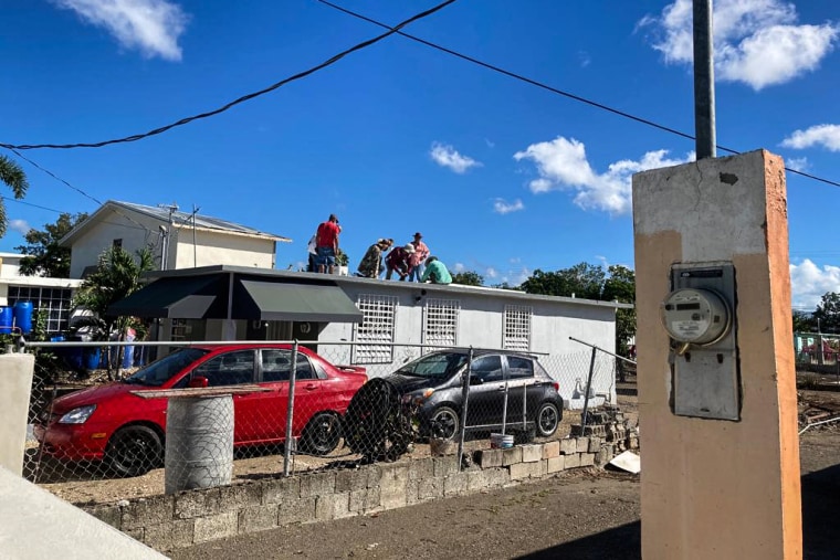 Rooftop solar panel being installed in the community El Coquí in Salinas, Puerto Rico.
