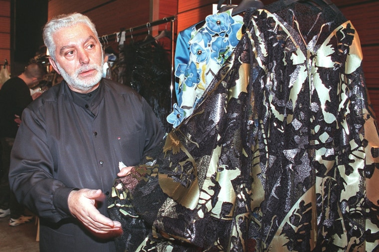 Image: Spanish Designer Paco Rabanne checks a dress before his 1999 Spring/Summer haute-couture collection, in Paris on Jan. 20, 1999.