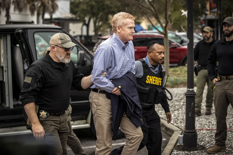 Image: Alex Murdaugh is escorted by law enforcement personnel to the Colleton County Courthouse for his double murder trial on Feb. 2, 2023, in Walterboro, S.C.