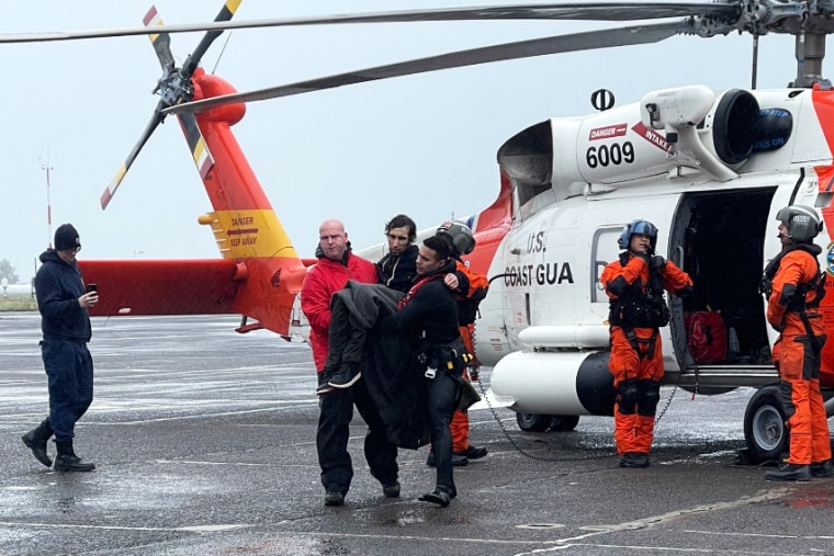 U.S. Coast Guard rescues a man who needed help when his vessel was caught in rough waters of the Columbia River in the Pacific Northwest on Friday.