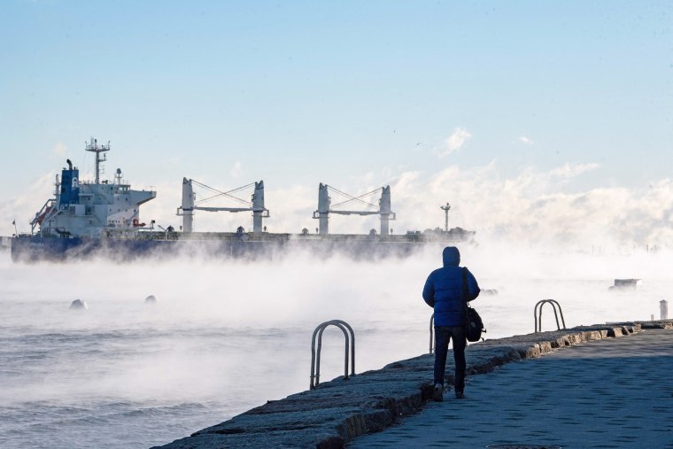 Steam rises from Boston Harbor as temperatures reach -7F in Boston