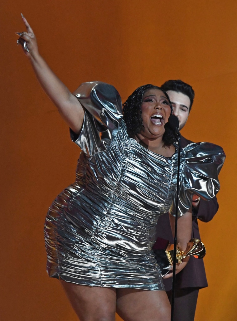 Lizzo accepts the award for record of the year. 