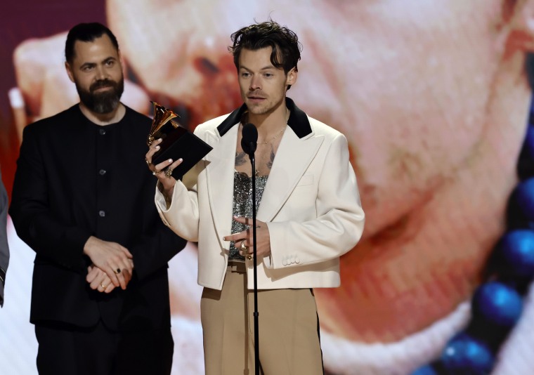 Harry Styles accepts the Best Pop Vocal Album award.
