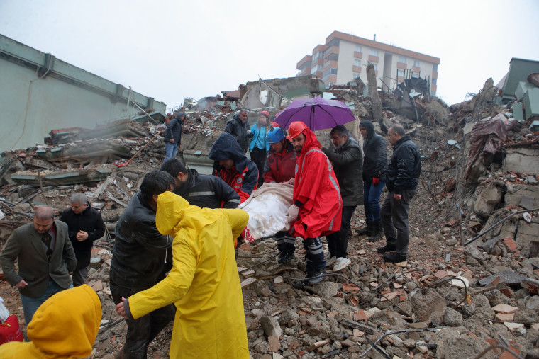 Mother and daughter rescued by personnel from under rubble of a collapsed building in Kahramanmaras