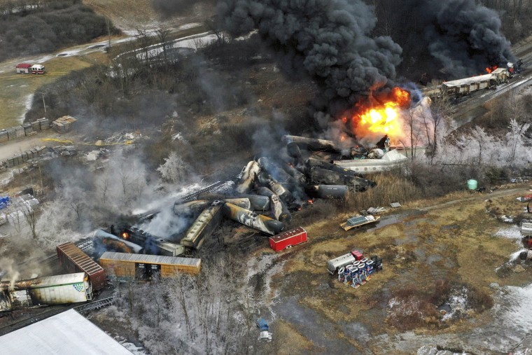 This photo taken with a drone shows portions of a Norfolk and Southern freight train that derailed Friday night in East Palestine, Ohio are still on fire at mid-day Saturday, Feb. 4, 2023. 