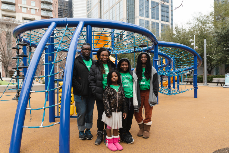 Lotanna and Aesha Egbuna with their three children Mia, Elijah, and Aniyah at Discovery Green Park.