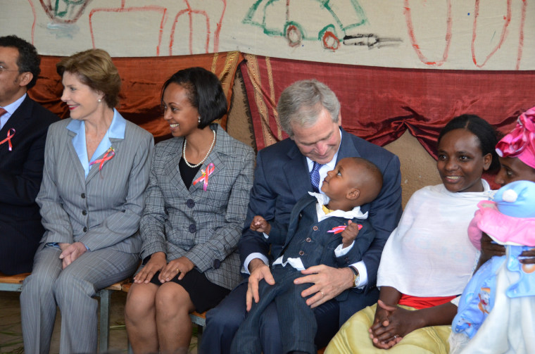 First lady Laura Bush and President George W. Bush at a PEPFAR site in Ethiopia in 2011.