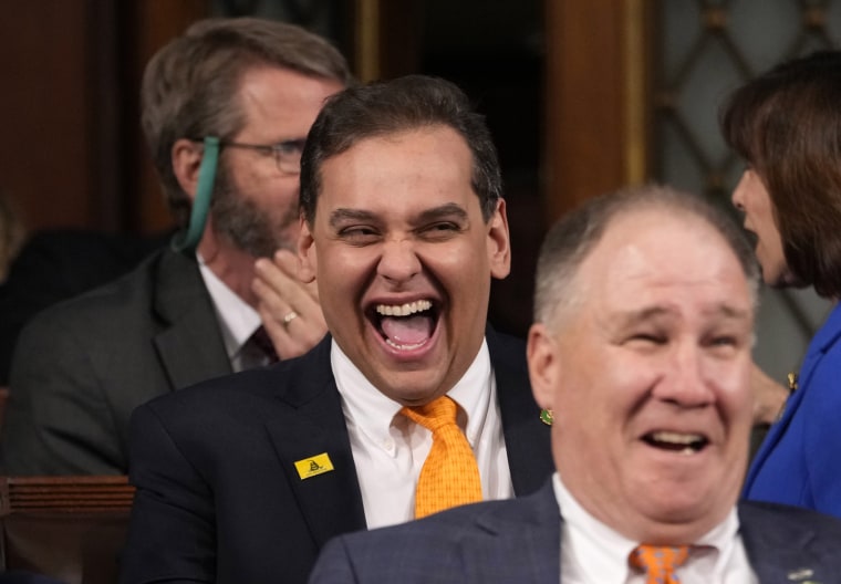 Image: Rep. George Santos, R-NY, laughs before the State of the Union on Tuesday.