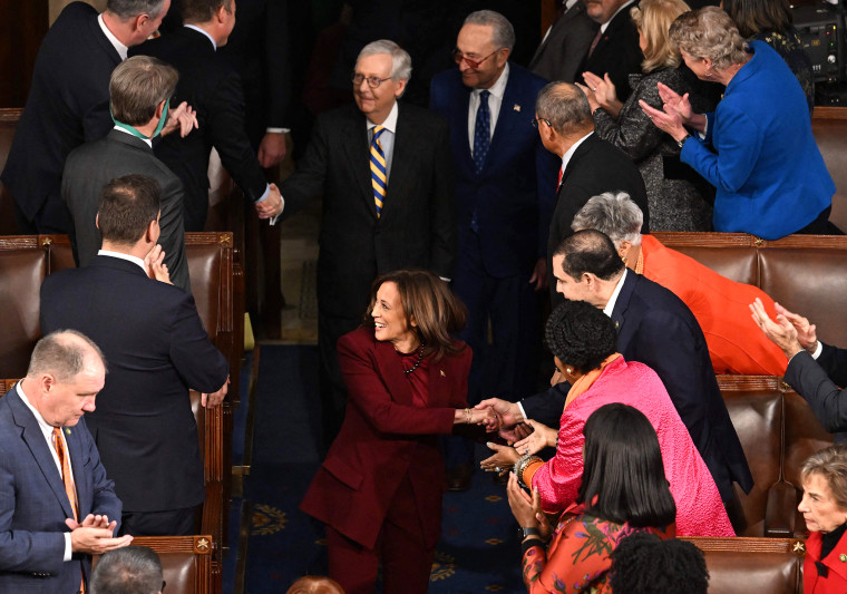 US Vice President Kamala Harris (C), followed by US Senate Majority Leader Chuck Schumer (C R rear,) and Minority Leader Mitch McConnell (C L, rear) arrive for US President Joe Biden's State of the Union address in the House Chamber of the US Capitol in Washington, DC, on February 7, 2023. (Photo by Jim WATSON / AFP) (Photo by JIM WATSON/AFP via Getty Images)