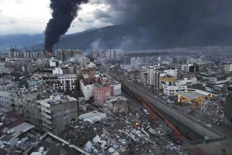 Television images on Tuesday showed thick black smoke rising from burning containers at Iskenderun Port. Reports said the fire was caused by containers that toppled over during the powerful earthquake that struck southeast Turkey on Monday. 