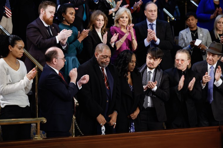 Rodney Wells and RowVaughn Wells, parents of Tyre Nichols, are applauded by Brandon Tsay, hero of the Monterey, California, shooting, Irish singer-songwriter Bono and Paul Pelosi, husband of Rep. Nancy Pelosi (D-CA), during U.S. President Joe Biden's State of the Union address in the House Chambers of the U.S. Capitol on February 07, 2023 in Washington, DC. The speech marks Biden's first address to the new Republican-controlled House.