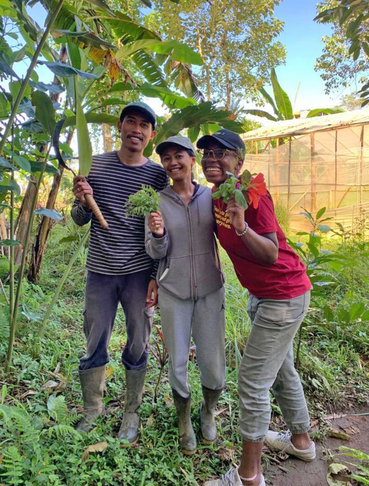 Eva Dickerson, center, in Thailand.