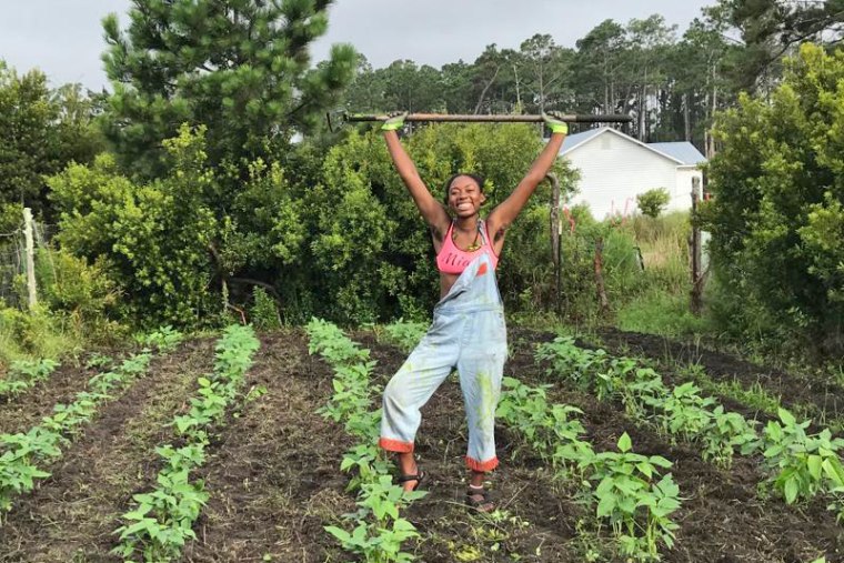 Eva Dickerson holding a shovel