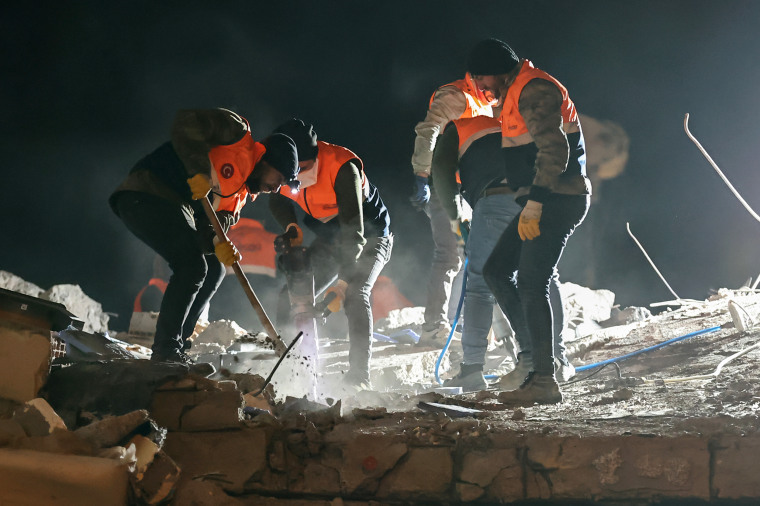 HATAY, TURKIYE - FEBRUARY 08: Personnel conduct search and rescue operations following 7.7 and 7.6 magnitude earthquakes hit Turkiye's multiple provinces on Feb. 06, including Iskenderun district of Hatay, Turkiye on February 08, 2023. Early Monday morning, a strong 7.7 earthquake, centered in the Pazarcik district, jolted Kahramanmaras and strongly shook several provinces, including Gaziantep, Sanliurfa, Diyarbakir, Adana, Adiyaman, Malatya, Osmaniye, Hatay, and Kilis. Later, at 13.24 p.m. (1024GMT), a 7.6 magnitude quake centered in Kahramanmaras' Elbistan district struck the region. Turkiye declared 7 days of national mourning on Feb. 06 after deadly earthquakes in southern provinces.