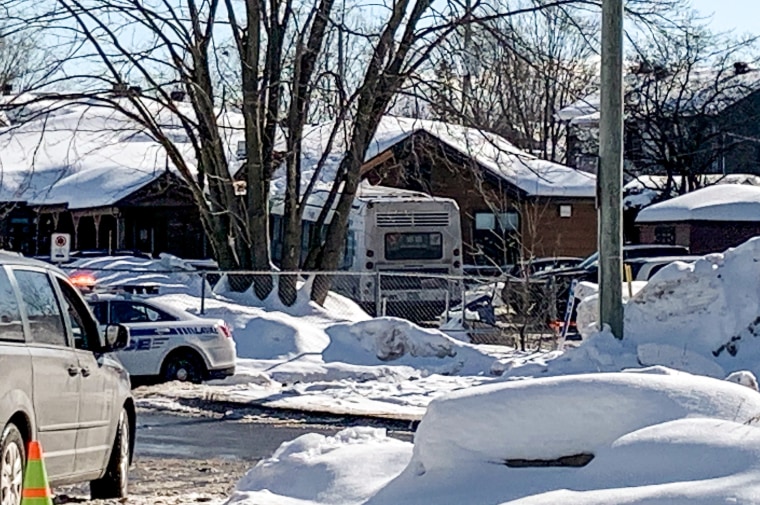 Image: Police secure the scene where a city bus crashed into a day care center on Feb. 8, 2023 in Laval, Canada.