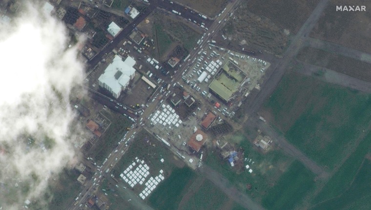 Tents erected in parking lots next to buildings in Nurdagi, Turkey, on Tuesday.