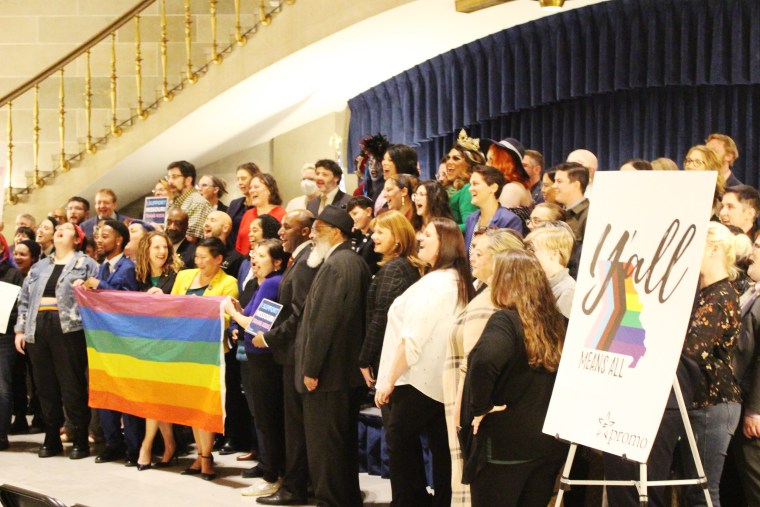 Members and advocates of the LGBTQ+ community demonstrate in the Missouri State Capitol rotunda in Jefferson City on Jan. 24, 2023, to oppose a slate of bills aimed at transgender youth.