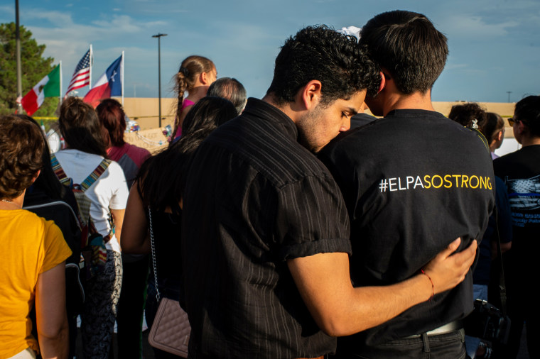 Mourners gather for a vigil at a memorial outside the Cielo Vista Walmart in El Paso, Texas, on Aug. 7, 2019.