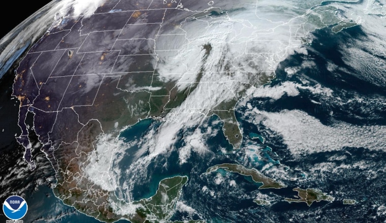 A storm system moves across the Eastern Seaboard on Thursday.