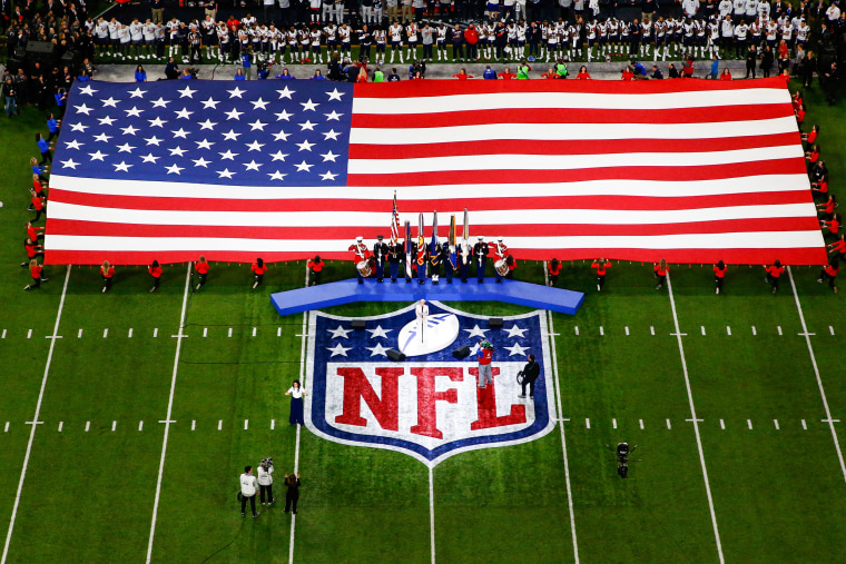 Pink sings the national anthem prior to Super Bowl LII between the New England Patriots and the Philadelphia Eagles on Feb. 4, 2018, in Minneapolis.