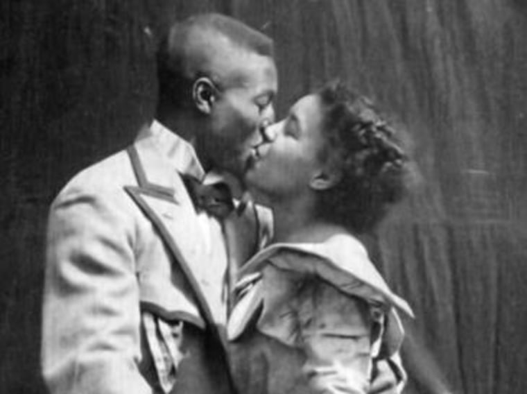 Saint Suttle and Gertie Brown embrace in the 1898 film "Something Good-Negro Kiss." 