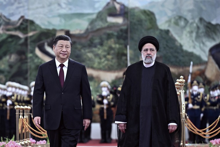 Chinese President Xi Jinping and Iranian President Ebrahim Raisi during a welcome ceremony at the Great Hall of the People in Beijing