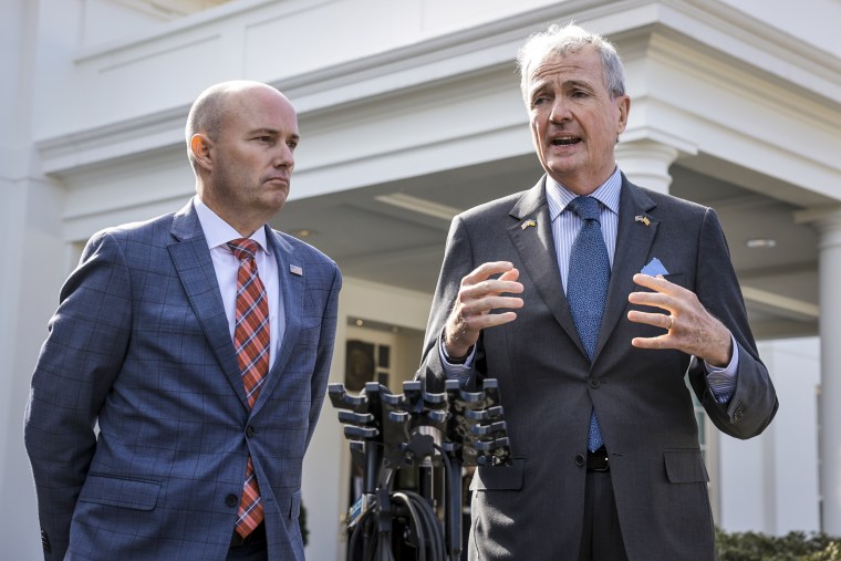 National Governors Association Vice Chair Gov. Spencer Cox, of Utah, and Chair Gov. Phil Murphy of N.J., right, speak to reporters outside the West Wing of the White House on Feb. 10, 2023.
