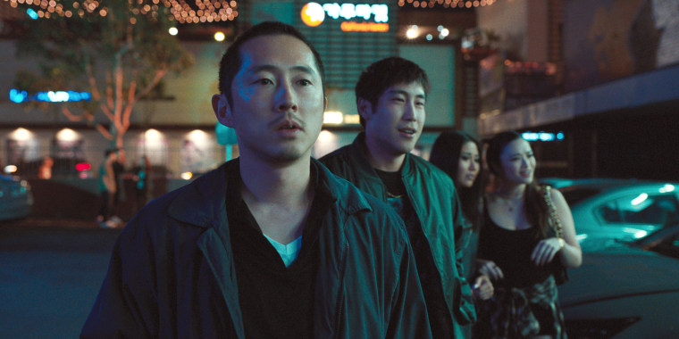 Steven Yeun, left, and Young Mazino in 
