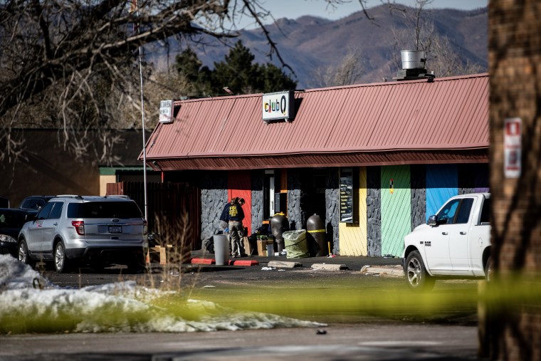 Investigators work outside of Club Q in Colorado Springs, Colo. 