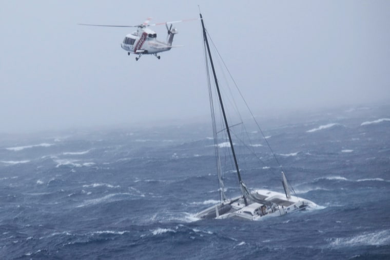 New Zealand Defence Force shows the rescue of a sailor from a catamaran near the Northland city of Whangarei. 