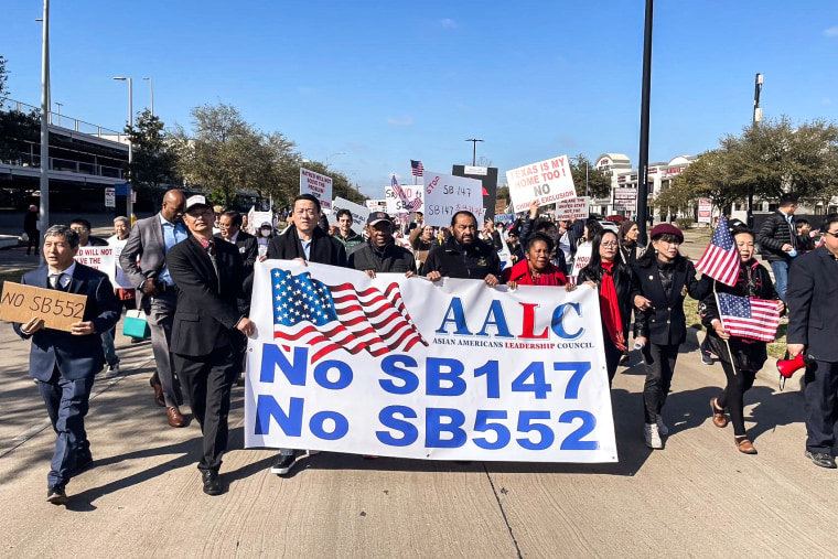 Protesters in Houston, Texas organize on Feb. 11, 2023 against proposed state Senate Bill 147, which would restrict citizens of China and three other countries from buying property in the state. 
