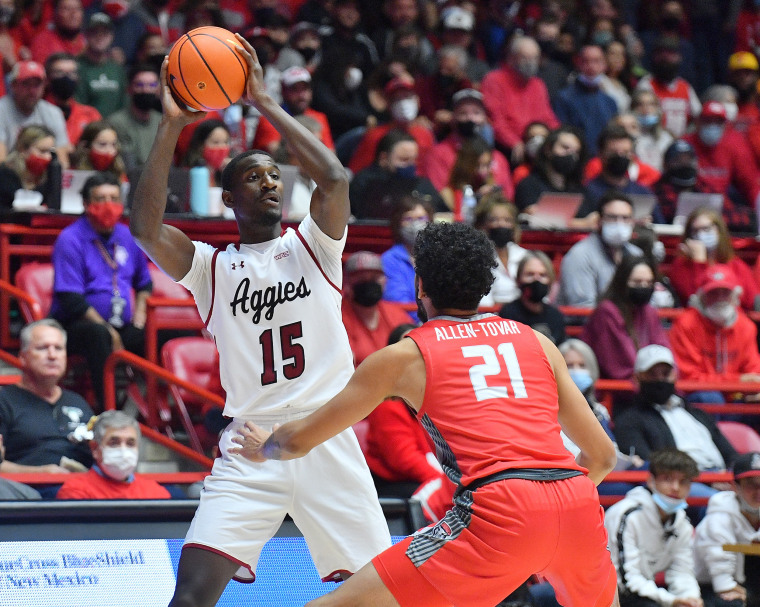 Mike Peake of the New Mexico State Aggies looks to pass during a game against the New Mexico Lobos on Dec. 6, 2021 in Albuquerque.