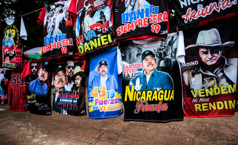 T-shirts with images of Nicaraguan President Daniel Ortega are sold at a bus station on the eve of the 43rd anniversary of the Nicaraguan Revolution in Managua, on July 18, 2022.