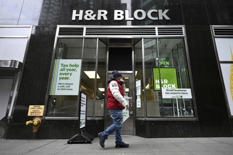 A person walks by an H&R Block office in New York