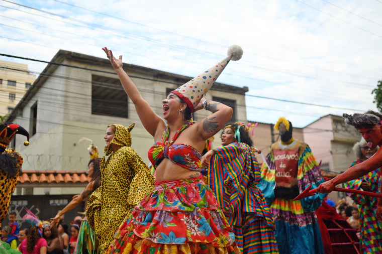 Revelers take part in a street carnival parade of the "Loucura Suburbana" in Rio de Janeiro