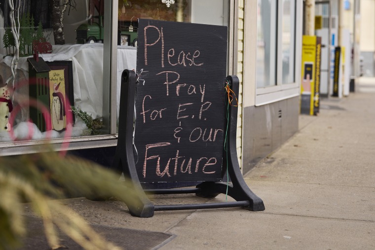 A sign outside a flower shop  on on in East Palestine, Ohio,