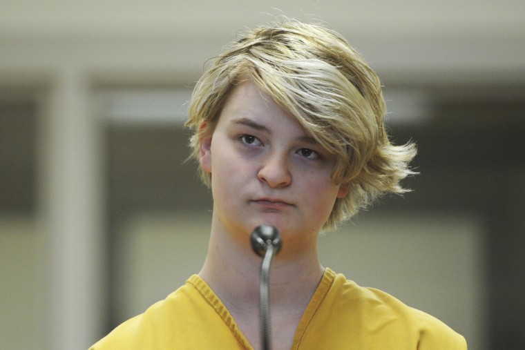 Denali Brehmer stands at her arraignment in the Anchorage Correctional Center in Anchorage, Alaska