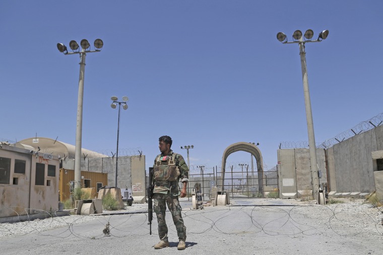 An Afghan National Army soldier stands guard at Bagram Air Base outside of Kabul, Afghanistan