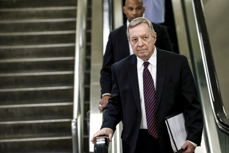 IMAGE: Senate Majority Whip Dick Durbin, D-II, walks to a closed-door, classified briefing for senators at the US Capitol on February 14, 2023.