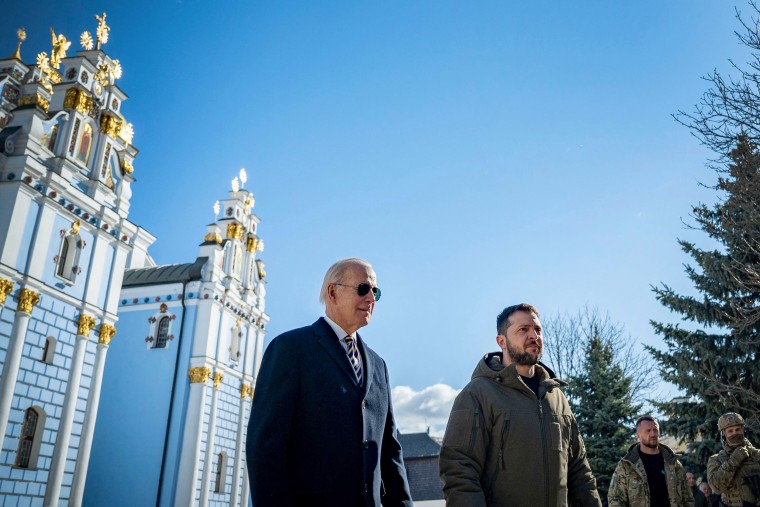 Image: UPresident Joe Biden walks with Ukrainian President Volodymyr Zelensky in front of St. Michaels Golden-Domed Cathedral as he arrives for a visit in Kyiv on Feb. 20, 2023.