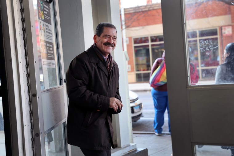 Chuy Garcia greets commuters  during an early-morning campaign stop in Chicago.